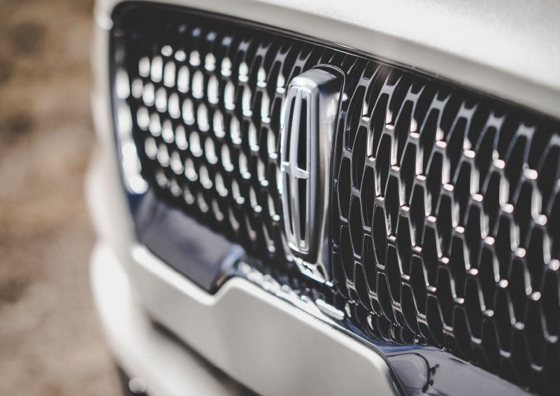 The grille of the 2024 Lincoln Aviator® Reserve model with an eye-catching repeated field of Lincoln Star logo shapes | Vista Lincoln Woodland Hills in Woodland Hills CA
