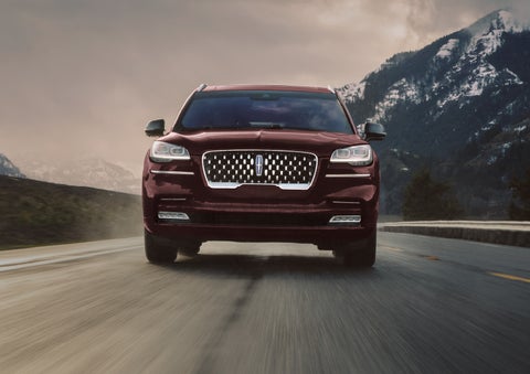 A 2024 Lincoln Aviator® SUV is shown in the Diamond Red exterior color. | Vista Lincoln Woodland Hills in Woodland Hills CA