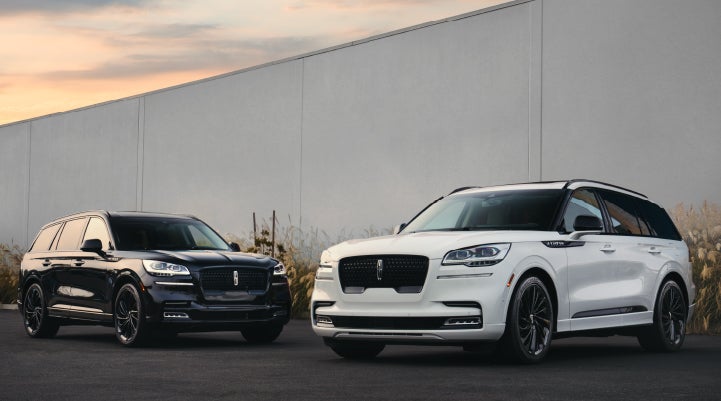 Two Lincoln Aviator® SUVs are shown with the available Jet Appearance Package | Vista Lincoln Woodland Hills in Woodland Hills CA