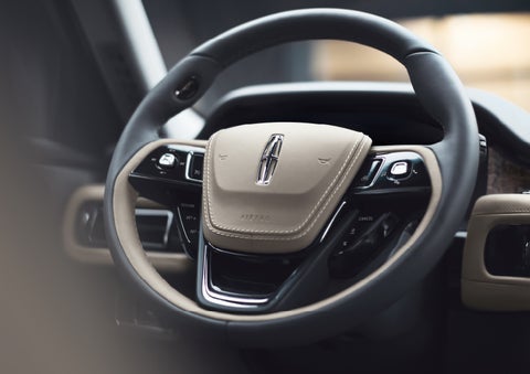 The intuitively placed controls of the steering wheel on a 2024 Lincoln Aviator® SUV | Vista Lincoln Woodland Hills in Woodland Hills CA