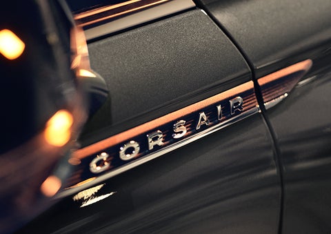 The stylish chrome badge reading “CORSAIR” is shown on the exterior of the vehicle. | Vista Lincoln Woodland Hills in Woodland Hills CA