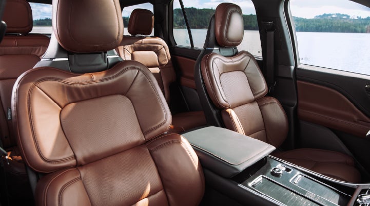 The front row's Perfect Position Seats in a 2024 Lincoln Aviator® Reserve model with Ebony Roast interior | Vista Lincoln Woodland Hills in Woodland Hills CA
