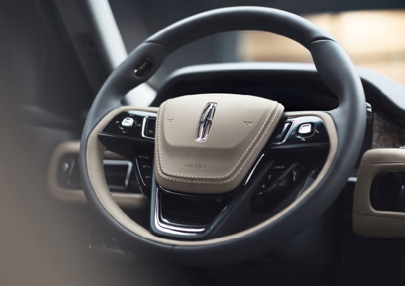 The intuitively placed controls of the steering wheel on a 2024 Lincoln Aviator® SUV | Vista Lincoln Woodland Hills in Woodland Hills CA