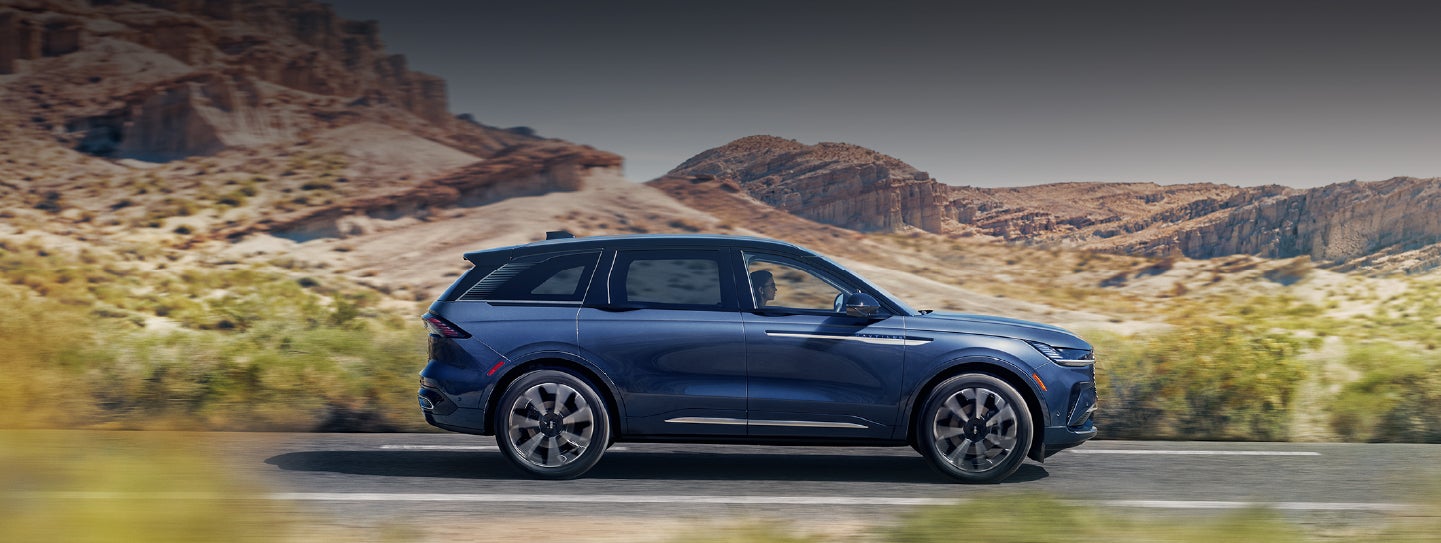 A 2024 Lincoln Nautilus® SUV is being driven in a desert setting. | Vista Lincoln Woodland Hills in Woodland Hills CA