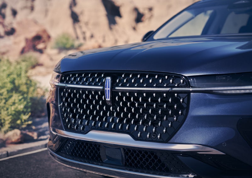 The stylish grille of a 2024 Lincoln Nautilus® SUV sparkles in the sunlight. | Vista Lincoln Woodland Hills in Woodland Hills CA