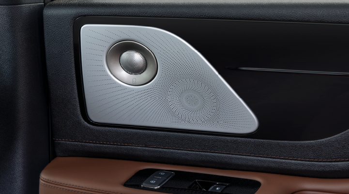 A close-up of a speaker located on the door’s interior is shown. | Vista Lincoln Woodland Hills in Woodland Hills CA