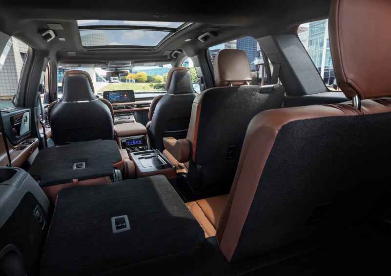 The interior of the 2025 Lincoln Aviator® SUV is shown with two seats folded down for added space. | Vista Lincoln Woodland Hills in Woodland Hills CA