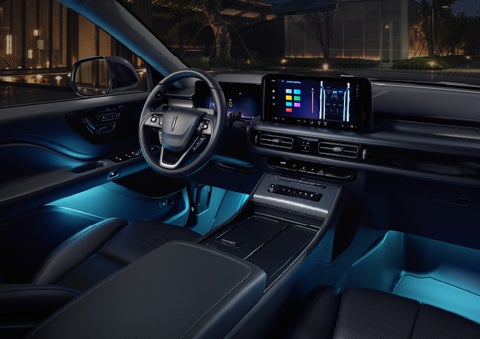 Deep blue Ambient Lighting glows from various places within a 2026 Lincoln Aviator® SUV. | Vista Lincoln Woodland Hills in Woodland Hills CA