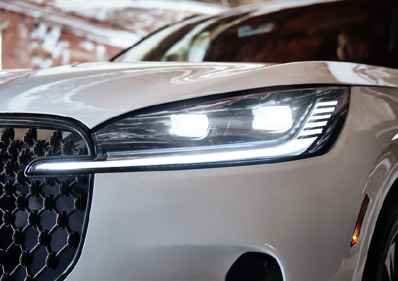 A close-up of a headlamp on the 2026 Lincoln Aviator® SUV is shown. | Vista Lincoln Woodland Hills in Woodland Hills CA