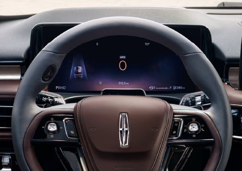 The driver’s information cluster display behind the steering wheel is shown. | Vista Lincoln Woodland Hills in Woodland Hills CA