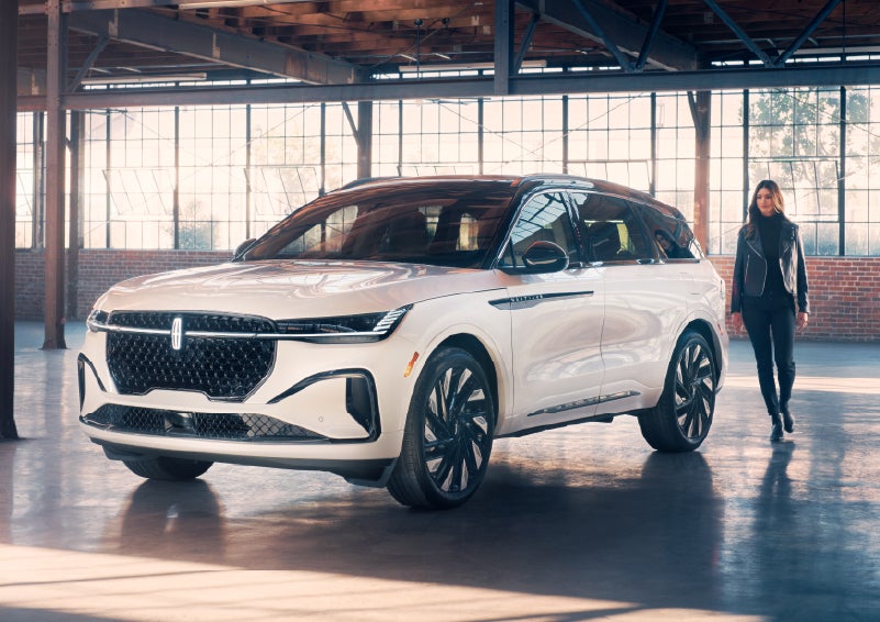 A person approaches a 2026 Lincoln Nautilus® SUV. | Vista Lincoln Woodland Hills in Woodland Hills CA